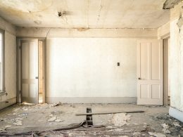 gray concrete walls with broken floor