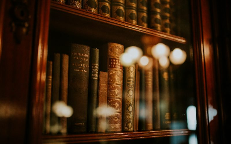 books in glass bookcase