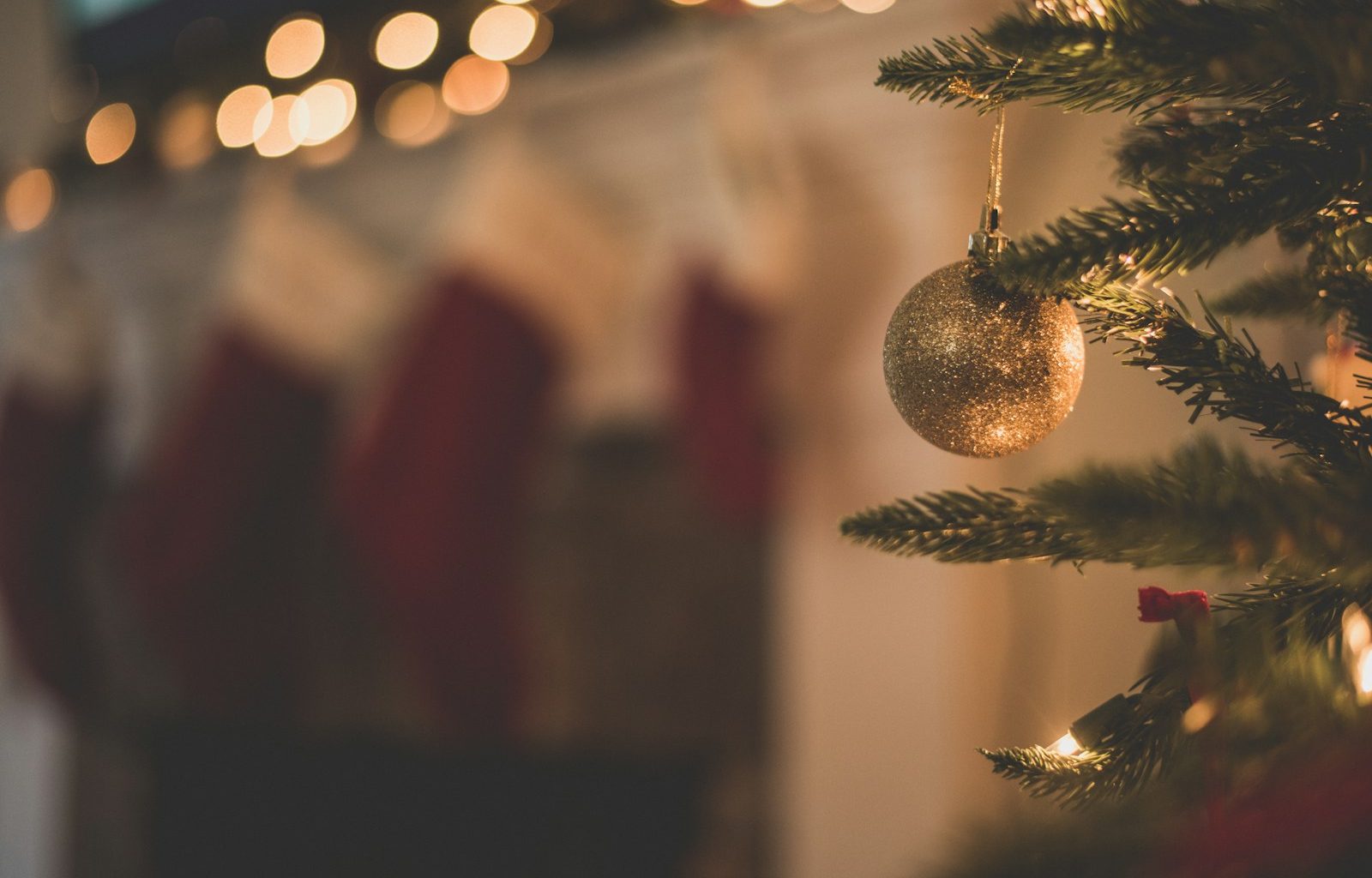 closeup photo of baubles on christmas tree