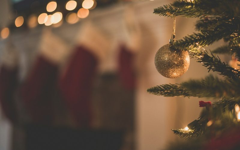 closeup photo of baubles on christmas tree