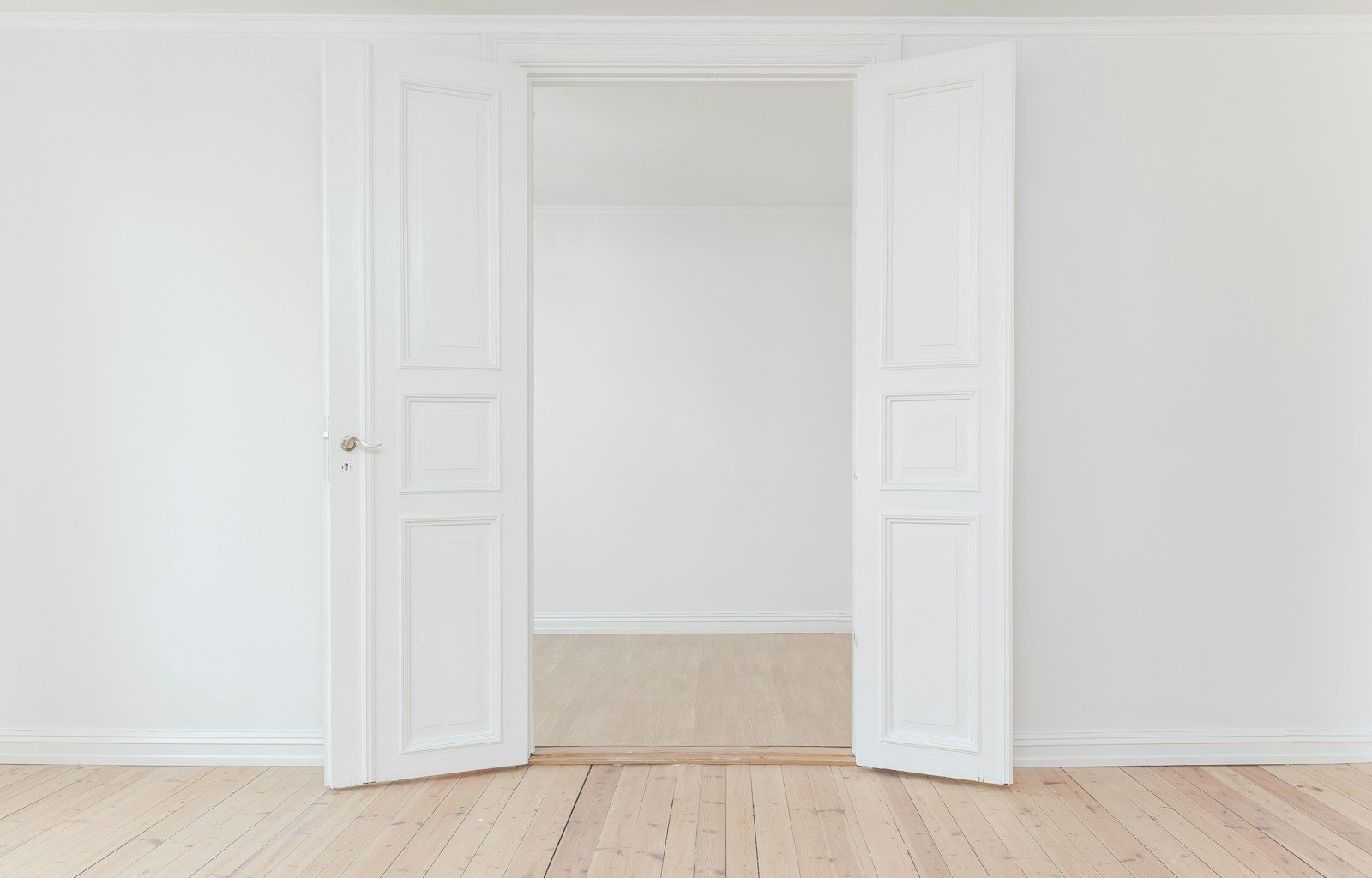 minimalist photography of open door