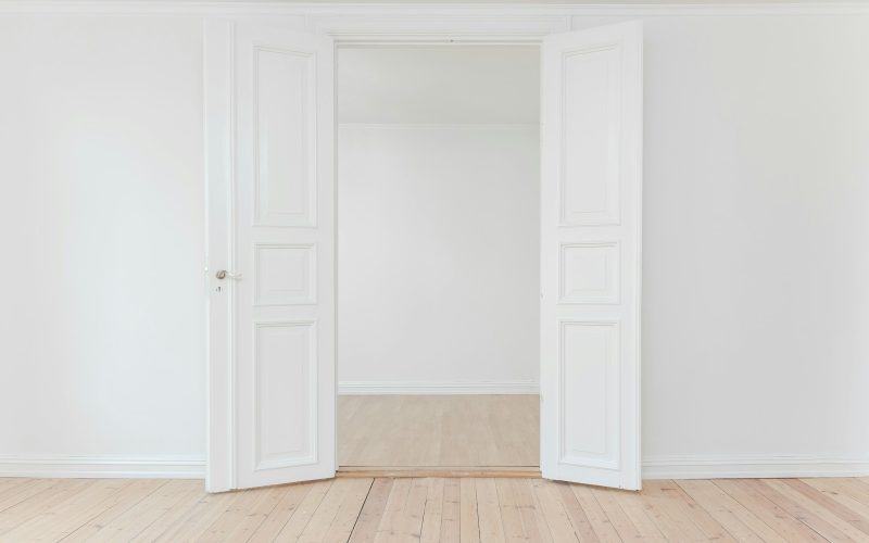 minimalist photography of open door