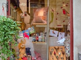 red wooden framed glass window